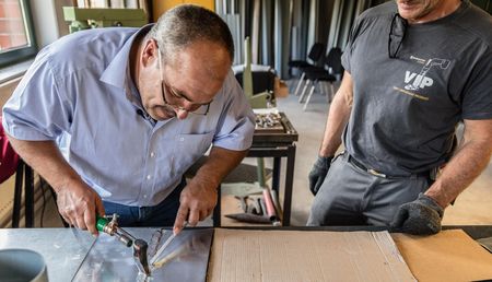 Handwerker auf einer Schulung / Workshop